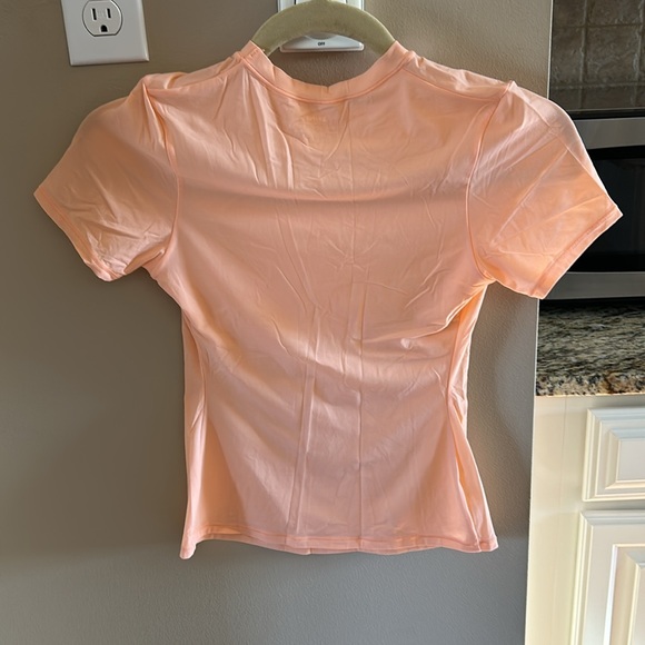 Bright peach short sleeve SKIMS top - Picture 3 of 8